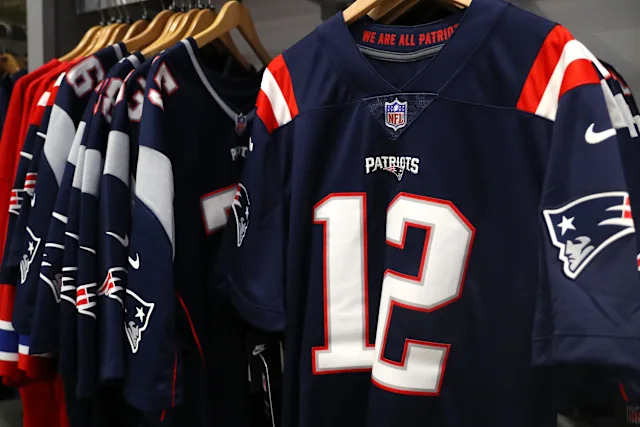 Number 12 Jersey Meaning? Tom Bradys Patriots and Buccaneers Story!